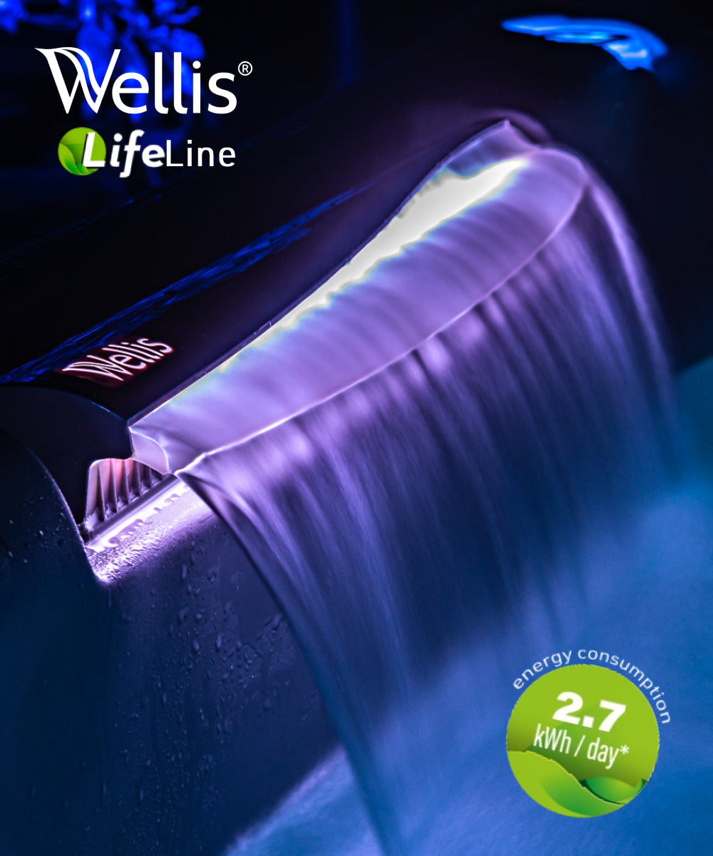 Waterfall with decorative lighting built into the hot tub